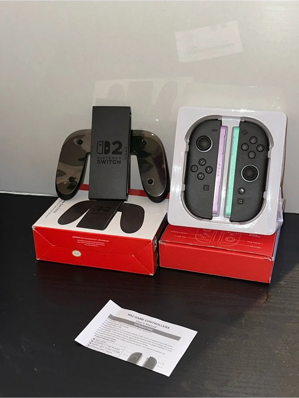 Nintendo Wireless Joy-Con Blue and Orange Accents with Nintendo game grip